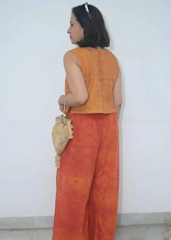 Orange sleeveless cotton tissue princess cut top